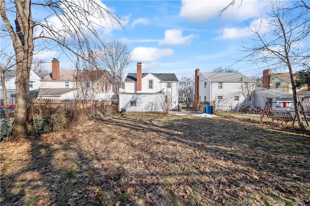 exterior space with a residential view and fence