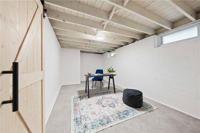 interior space featuring concrete block wall