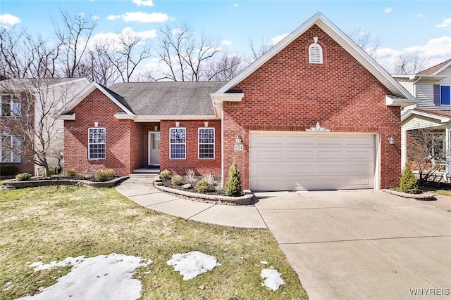 view of front of house with a front yard, driveway, a shingled roof, a garage, and brick siding