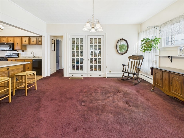 sitting room featuring visible vents, a baseboard heating unit, an inviting chandelier, and dark colored carpet