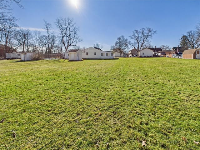 view of yard with a residential view