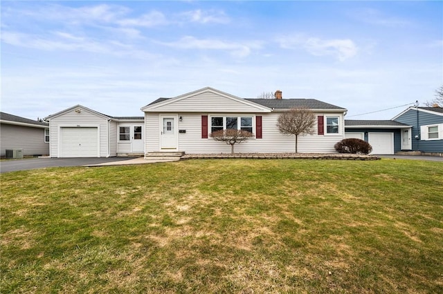 ranch-style house with aphalt driveway, a garage, central AC, and a front lawn