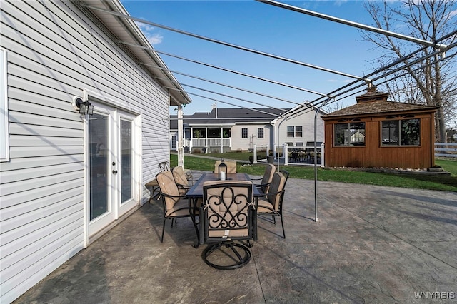 view of patio with a gazebo and outdoor dining space