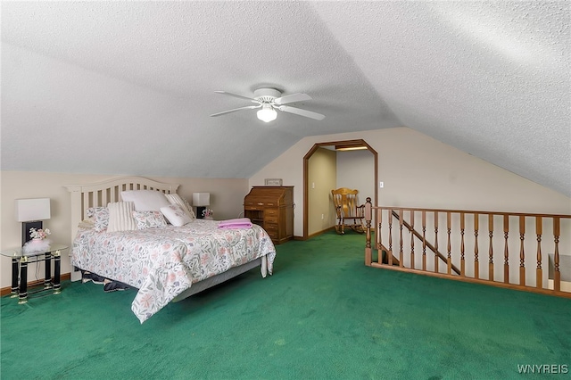 bedroom featuring a ceiling fan, a textured ceiling, carpet, baseboards, and vaulted ceiling