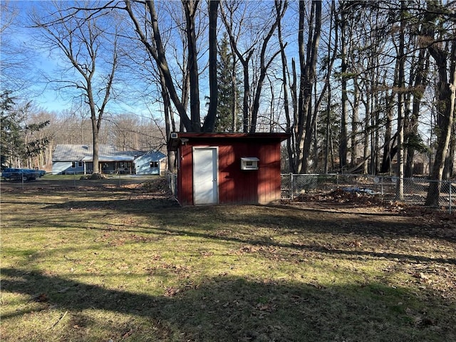 view of shed featuring a fenced backyard