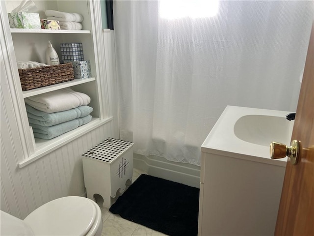 bathroom with vanity, toilet, shower / bathtub combination with curtain, and tile patterned flooring