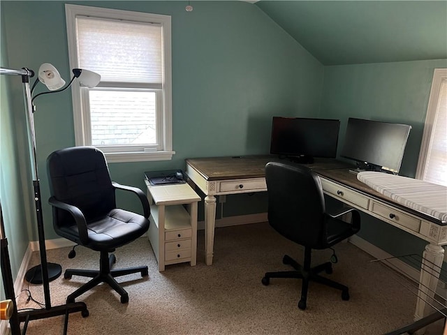 office featuring baseboards, carpet, and lofted ceiling