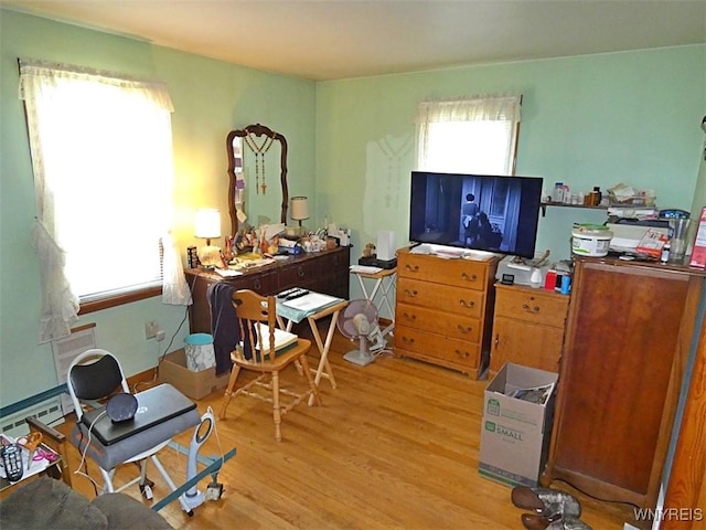 office space featuring light wood-style flooring