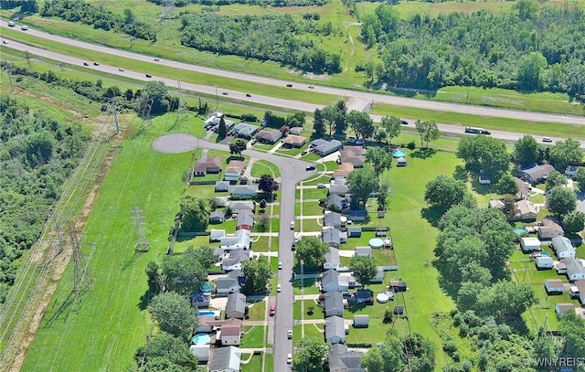 birds eye view of property with a residential view