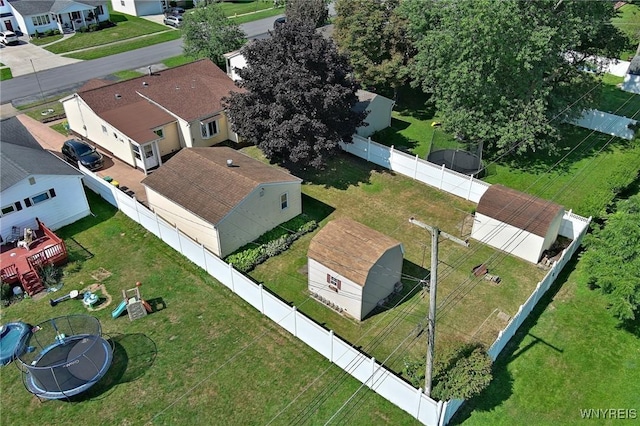 birds eye view of property with a residential view