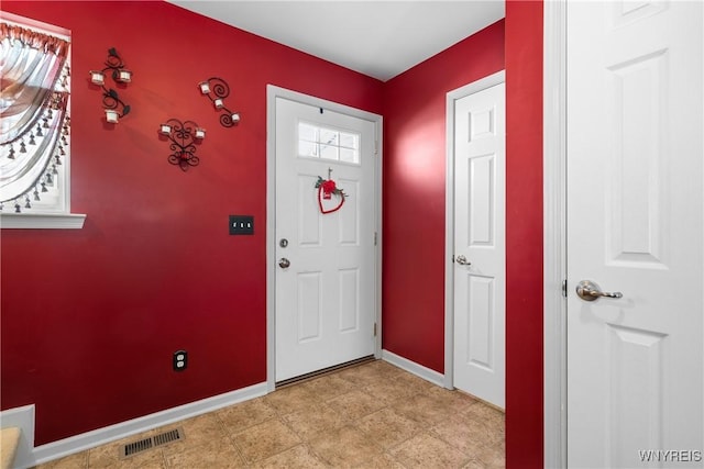 entryway featuring visible vents and baseboards