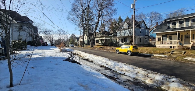 view of street with a residential view and sidewalks