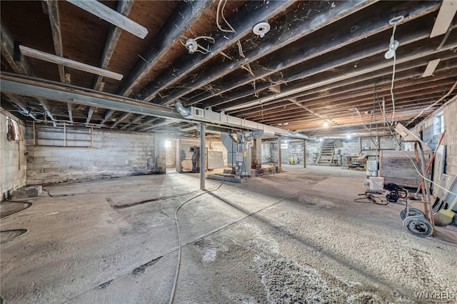 unfinished basement with heating unit