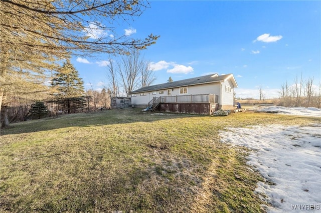 view of yard with a deck