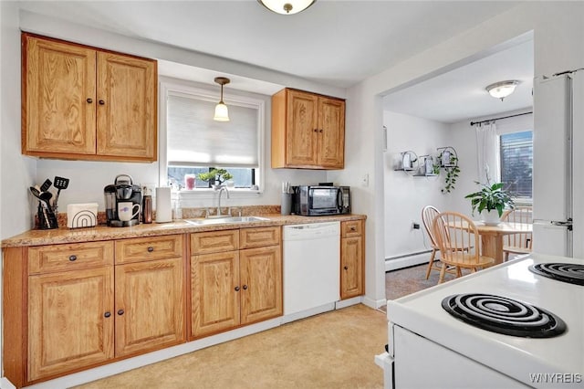 kitchen with white appliances, light countertops, a baseboard heating unit, and a sink