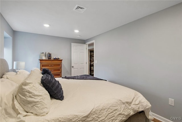 bedroom featuring recessed lighting, baseboards, and visible vents