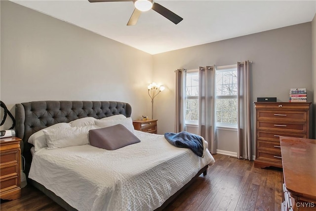 bedroom with dark wood finished floors, baseboards, and ceiling fan