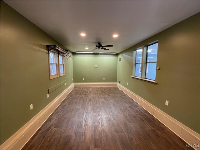 unfurnished room with recessed lighting, dark wood-style floors, baseboards, and ceiling fan