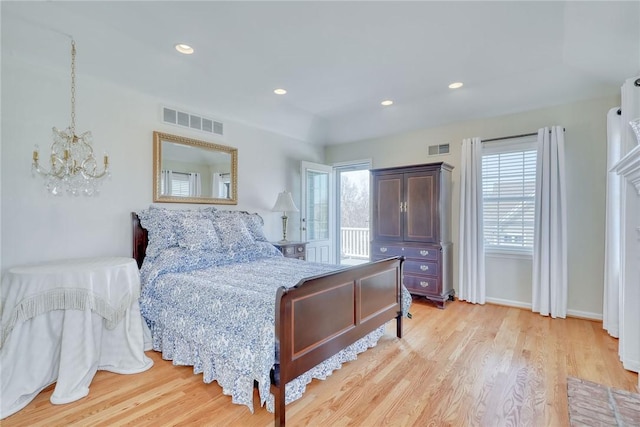 bedroom featuring recessed lighting, visible vents, and light wood finished floors