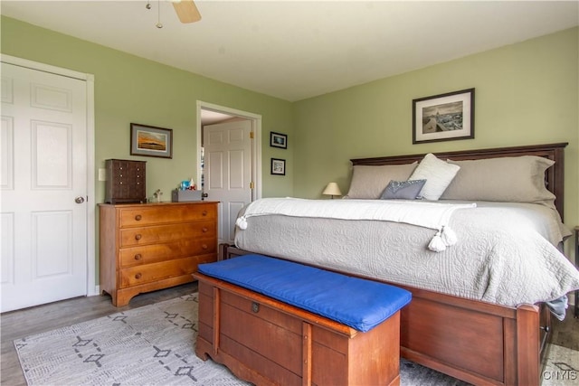 bedroom featuring a ceiling fan and light wood-style floors