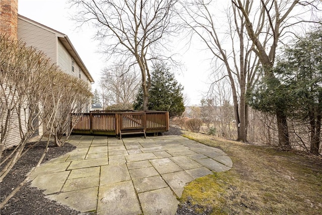 view of patio / terrace featuring a wooden deck