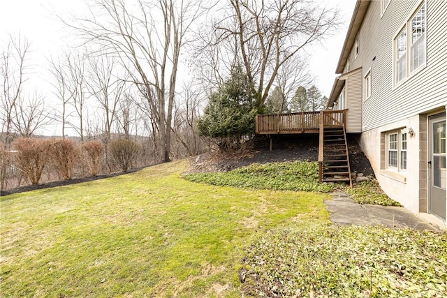 view of yard featuring stairway and a deck