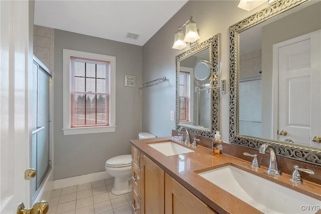 full bath with a shower with shower door, toilet, visible vents, and a sink