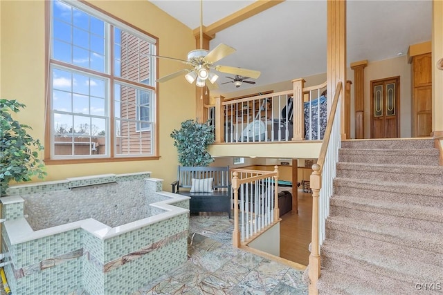 interior space featuring a ceiling fan