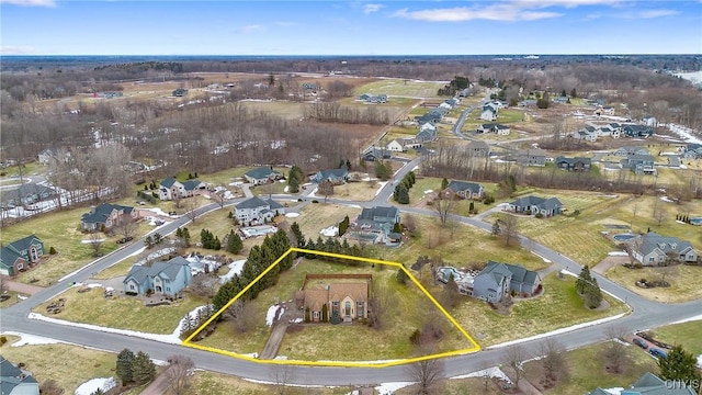 birds eye view of property with a residential view