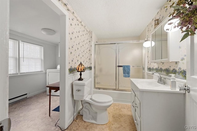 full bath with vanity, a baseboard radiator, wallpapered walls, washer / dryer, and toilet