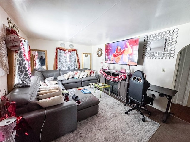 living area featuring carpet flooring