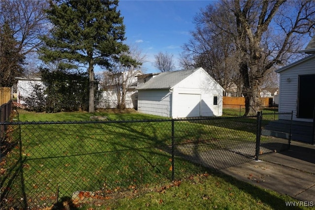 view of yard featuring an outbuilding, a fenced backyard, and a shed