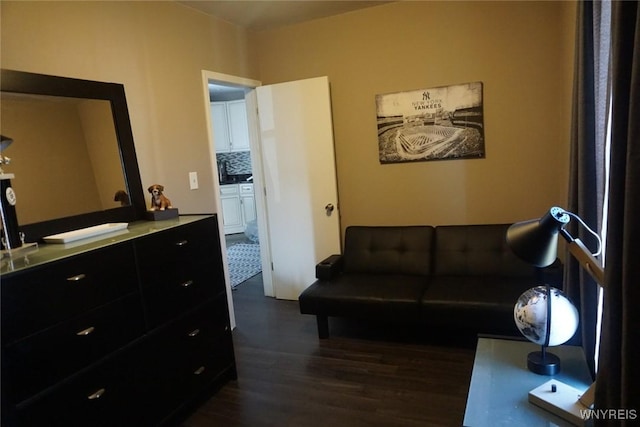 living area with dark wood finished floors