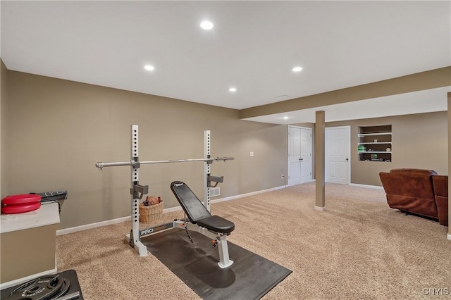 workout room with carpet flooring, recessed lighting, baseboards, and built in features