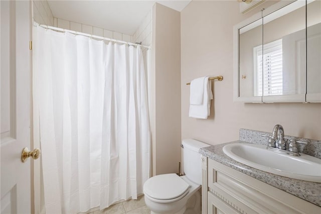 full bathroom with a shower with shower curtain, toilet, vanity, and tile patterned flooring