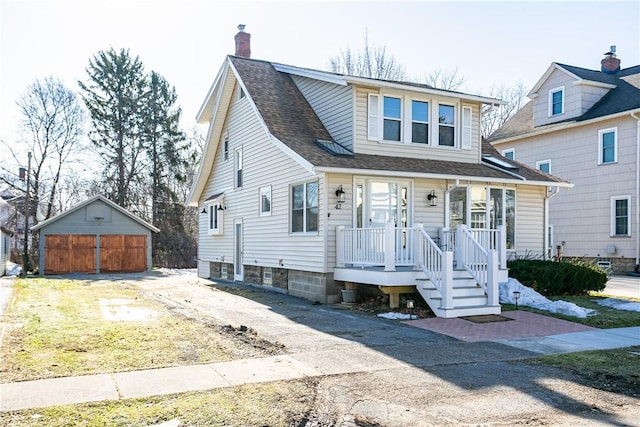 view of front of house with a garage, roof with shingles, and a chimney