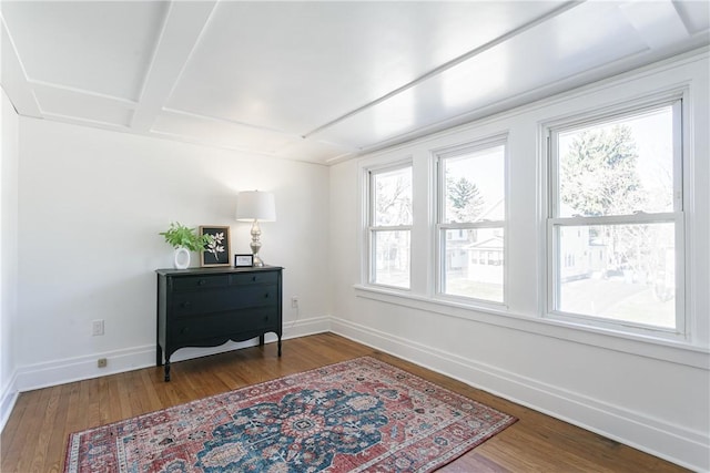 sitting room with wood finished floors and baseboards