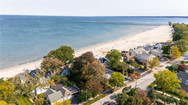 bird's eye view with a residential view, a beach view, and a water view