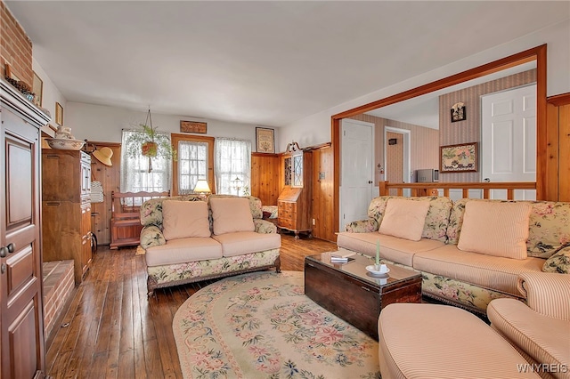 living area with hardwood / wood-style flooring