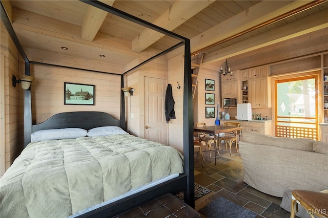 bedroom featuring beam ceiling, wooden walls, wood ceiling, and stone tile flooring