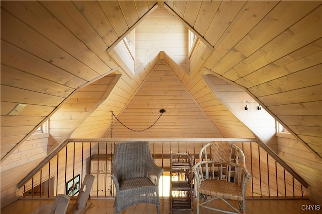 bonus room featuring vaulted ceiling and wood ceiling