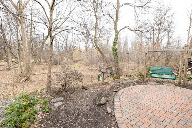 view of yard with fence and a patio area