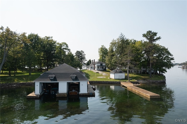 view of dock with a water view and boat lift