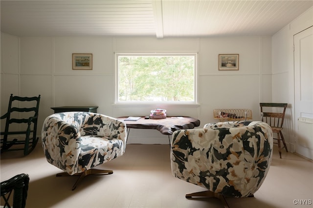 living area featuring wooden ceiling