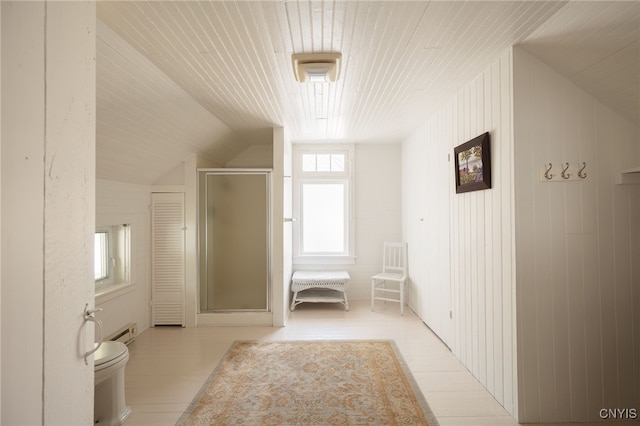 full bath featuring toilet, wooden ceiling, a shower stall, lofted ceiling, and baseboard heating