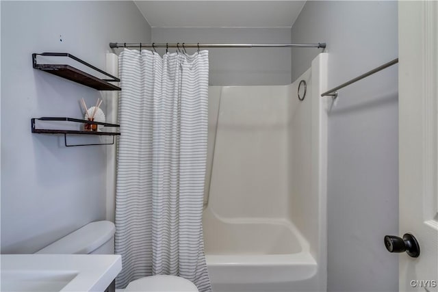 bathroom with vanity, toilet, and shower / tub combo with curtain