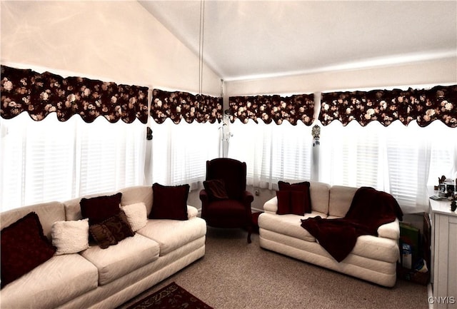 living area featuring lofted ceiling and carpet flooring