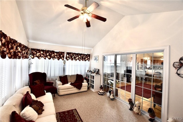 carpeted living area featuring plenty of natural light, high vaulted ceiling, and a ceiling fan