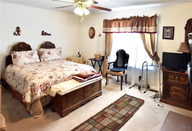 bedroom with light colored carpet and ceiling fan