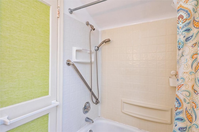 bathroom featuring shower / bath combo with shower curtain